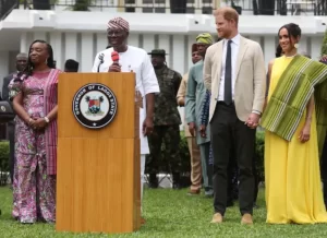 Lagos Governor acknowledging Prince Harry and wife